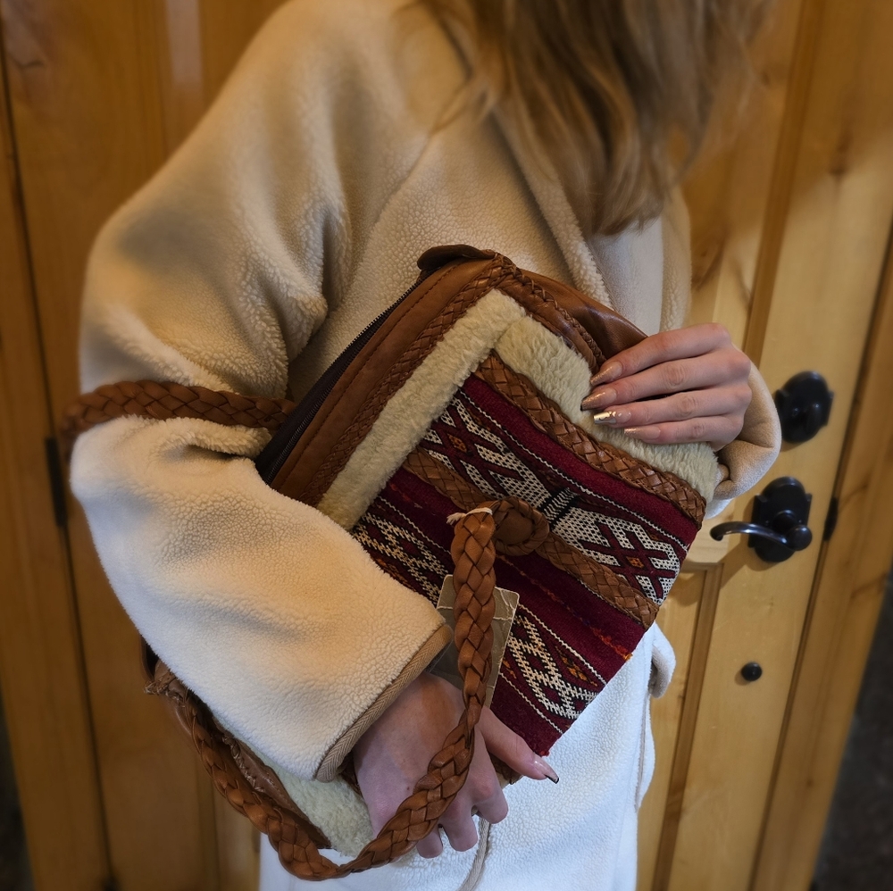 Anthropologie En Shalla Barrel Leather Sherpa Duffle Bag.